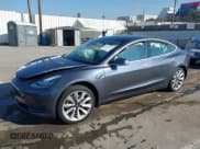 ✅ 2020 Tesla Model 3 Standard Range Plus • VIN: 5YJ3E1EA9LF662591 • Lot: 43642335. Listed on IAAI with 25,888 mi. Free auction sales archive from the USA and detailed vehicle history report at DreamBid. Image 2.