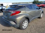 ✅ 2021 Toyota C-HR LE • VIN: NMTKHMBX1MR121947 • Lot: 43426865. Listed on IAAI with 24,545 mi. Free auction sales archive from the USA and detailed vehicle history report at DreamBid. Image 4.