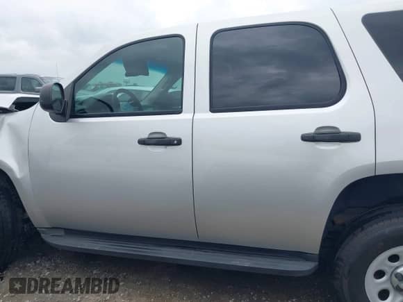 2011 Chevrolet Tahoe Commercial with VIN 1GNSK2E04BR374401, listed as a IAAI auction lot 41960892 with 86,267 mi miles and . Bid and sale history available at DreamBid. Image 15.