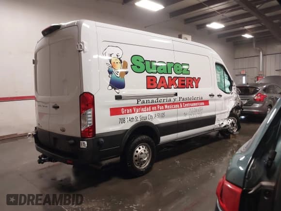 ✅ 2024 Ford Transit Cargo • VIN: 1FTBR2C81RKA01686 • Lot: 41100566. Listed on IAAI with 74,842 mi. Free auction sales archive from the USA and detailed vehicle history report at DreamBid. Image 4.