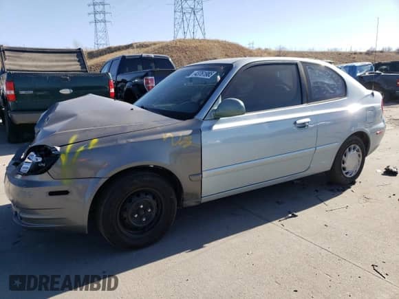 2005 Hyundai Accent GLS z VIN KMHCG35C55U337255, wystawiony jako Copart lot #43761985 z przebiegiem 192 585 mil mil oraz Szkoda całkowita • Salvage title. Historia ofert i sprzedaży dostępna na DreamBid. Obrazek 1.