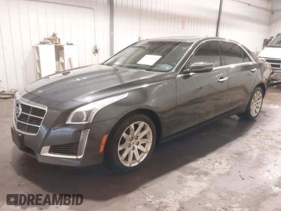 ✅ 2014 Cadillac CTS Luxury AWD • VIN: 1G6AX5S37E0172041 • Лот: 40343343. Опубликован ранее на IAAI с пробегом 102 506 миль. Бесплатный доступ к архиву аукционных продаж из США и подробный отчёт об истории автомобиля на DreamBid. Изображение 2.