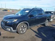 ✅ 2018 Honda Ridgeline RTL-E • VIN: 5FPYK3F78JB013981 • Lot: 41844954. Listed on IAAI with 101,794 mi. Free auction sales archive from the USA and detailed vehicle history report at DreamBid. Image 2.