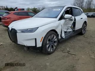 ✅ 2024 BMW iX xDrive50 • VIN: WB523CF00RCP42785 • Лот: 51465784. Опубликован ранее на Copart с пробегом Не указан. Бесплатный доступ к архиву аукционных продаж из США и подробный отчёт об истории автомобиля на DreamBid. Изображение 1.