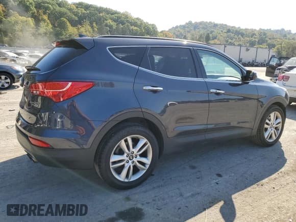 ✅ 2016 Hyundai Santa Fe • VIN: 5XYZWDLA6GG362050 • Лот: 70861453. Опубликован ранее на Copart с пробегом 62 065 миль. Бесплатный доступ к архиву аукционных продаж из США и подробный отчёт об истории автомобиля на DreamBid. Изображение 3.