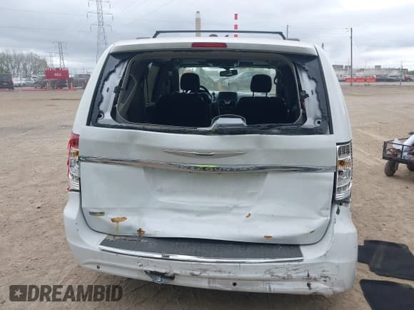 ✅ 2014 Chrysler Town & Country Touring L • VIN: 2C4RC1CG0ER239526 • Lot: 43384005. Listed on IAAI with 128,813 mi. Free auction sales archive from the USA and detailed vehicle history report at DreamBid. Image 16.