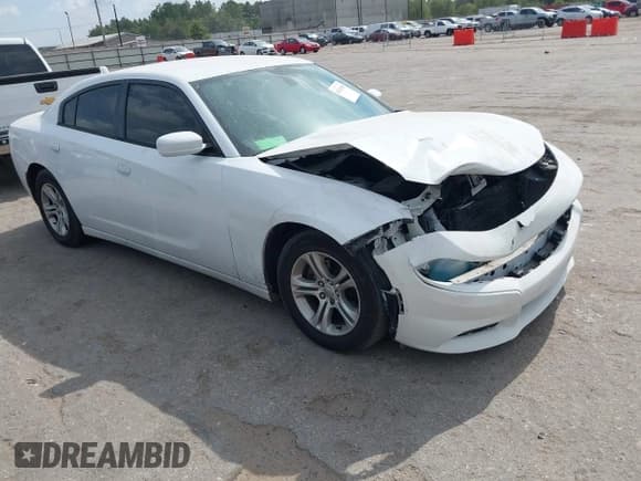 ✅ 2015 Dodge Charger SE • VIN: 2C3CDXBG6FH771740 • Lot: 43520966. Listed on IAAI with 127,429 mi. Free auction sales archive from the USA and detailed vehicle history report at DreamBid. Image 1.