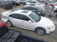 ✅ 2014 Chevrolet Impala LTZ • VIN: 2G1WC5E33E1167345 • Lot: 43548449. Listed on IAAI with 222,330 mi. Free auction sales archive from the USA and detailed vehicle history report at DreamBid. Image 13.