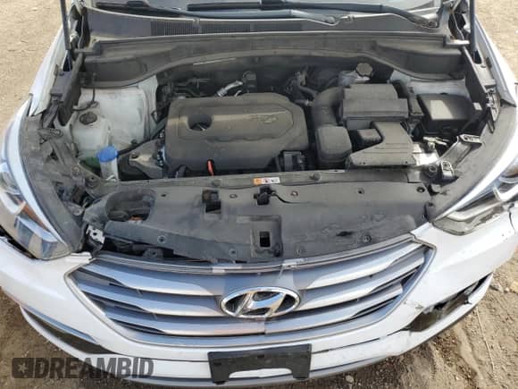 2018 Hyundai Santa Fe 2.4L z VIN 5NMZUDLB5JH065895, wystawiony jako Copart lot #85318895 z przebiegiem 54 993 mil mil oraz Szkoda całkowita • Salvage title. Historia ofert i sprzedaży dostępna na DreamBid. Obrazek 11.