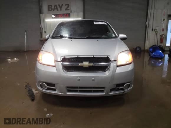 2008 Chevrolet Aveo LS z VIN KL1TD56648B050756, wystawiony jako Copart lot #85865394 z przebiegiem 108 033 mil mil oraz Szkoda całkowita • Salvage title. Historia ofert i sprzedaży dostępna na DreamBid. Obrazek 5.
