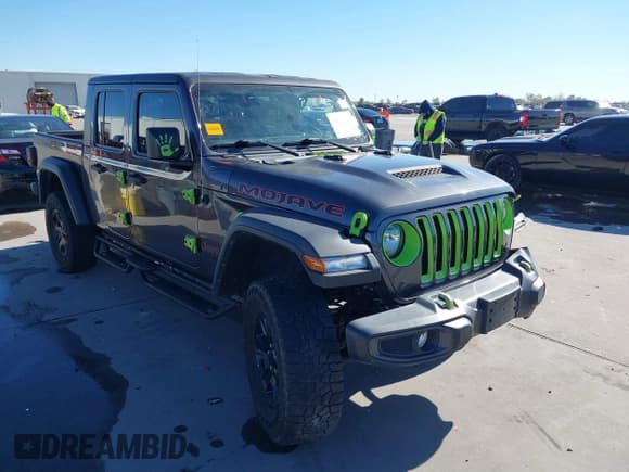 ✅ 2023 Jeep Gladiator Mojave • VIN: 1C6JJTEGXPL517914 • Lot: 43666074. Listed on IAAI with 33,445 mi. Free auction sales archive from the USA and detailed vehicle history report at DreamBid. Image 1.