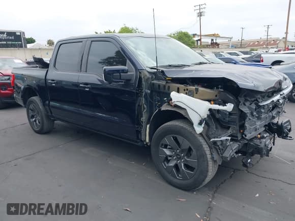 ✅ 2023 Ford F-150 Lightning Pro • VIN: 1FTVW1EV6PWG28652 • Лот: 42338698. Опубликован ранее на IAAI с пробегом 25 097 миль. Бесплатный доступ к архиву аукционных продаж из США и подробный отчёт об истории автомобиля на DreamBid. Изображение 1.