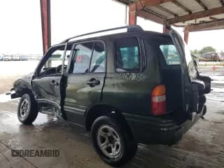 ✅ 2000 Suzuki Vitara JLS • VIN: 2S3TE52VXY6110157 • Lot: 79173714. Wystawiony na Copart z przebiegiem 165 283 mil. Bezpłatny archiwum sprzedaży aukcyjnych z USA i szczegółowy raport historii pojazdu na DreamBid. Zdjęcie 2.