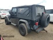 ✅ 2005 Jeep Wrangler Unlimited • VIN: 1J4FA44S25P335120 • Lot: 70306025. Listed on Copart with 137,315 mi. Free auction sales archive from the USA and detailed vehicle history report at DreamBid. Image 2.