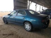 ✅ 1997 Nissan Altima XE • VIN: 1N4BU31D2VC163745 • Lot: 45582405. Listed on Copart with 138,597 mi. Free auction sales archive from the USA and detailed vehicle history report at DreamBid. Image 2.