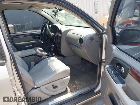 ✅ 2005 GMC Envoy SLT • VIN: 1GKET16M756176825 • Lot: 42643816. Listed on IAAI with 142,328 mi. Free auction sales archive from the USA and detailed vehicle history report at DreamBid. Image 5.