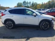 ✅ 2016 Mazda CX-5 Grand Touring • VIN: JM3KE4DY8G0908425 • Lot: 43350691. Wystawiony na IAAI z przebiegiem 144 684 mil. Bezpłatny archiwum sprzedaży aukcyjnych z USA i szczegółowy raport historii pojazdu na DreamBid. Zdjęcie 13.