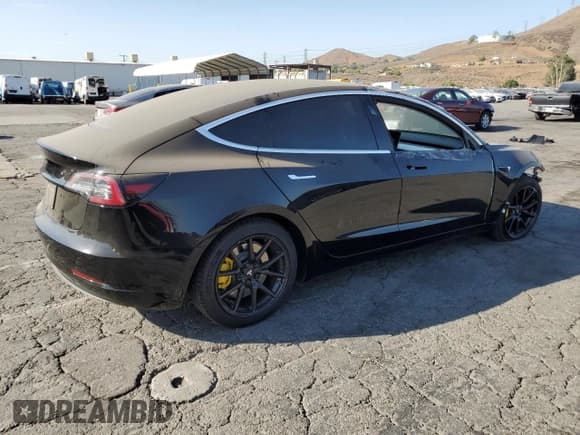 ✅ 2019 Tesla Model 3 Mid Range • VIN: 5YJ3E1EA3KF431412 • Lot: 69645775. Listed on Copart with 114,104 mi. Free auction sales archive from the USA and detailed vehicle history report at DreamBid. Image 3.