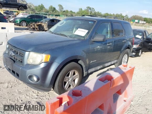 ✅ 2010 Ford Escape Hybrid • VIN: 1FMCU4K37AKB21643 • Lot: 41618266. Listed on IAAI with 262,251 mi. Free auction sales archive from the USA and detailed vehicle history report at DreamBid. Image 2.