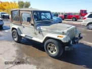 ✅ 1992 Jeep Wrangler • VIN: 2J4FY49S2NJ548683 • Lot: 43616514. Listed on IAAI with 92,516 mi. Free auction sales archive from the USA and detailed vehicle history report at DreamBid. Image 1.