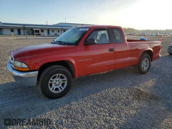 2002 Dodge Dakota SLT с VIN 1B7GL42N72S500329, выставлен на аукционе Copart как лот 75703164 с пробегом 159 391 миль миль и Списание • Salvage title. История ставок и продаж доступна на DreamBid. Изображение 1.