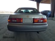✅ 1999 Lexus ES 300 • VIN: JT8BF28G0X0230506 • Лот: 46377375. Опубликован ранее на Copart с пробегом 103 192 миль. Бесплатный доступ к архиву аукционных продаж из США и подробный отчёт об истории автомобиля на DreamBid. Изображение 6.
