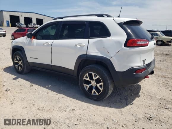 ✅ 2016 Jeep Cherokee Trailhawk • VIN: 1C4PJMBS3GW102000 • Лот: 60866505. Опубликован ранее на Copart с пробегом 120 985 миль. Бесплатный доступ к архиву аукционных продаж из США и подробный отчёт об истории автомобиля на DreamBid. Изображение 2.