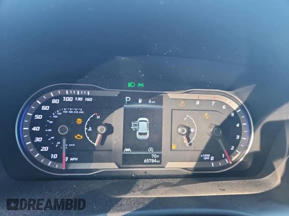 2023 Hyundai Tucson SEL with VIN 5NMJBCAE2PH279827, listed as a Copart auction lot 82166985 with 65,784 mi miles and Salvage title. Bid and sale history available at DreamBid. Image 9.