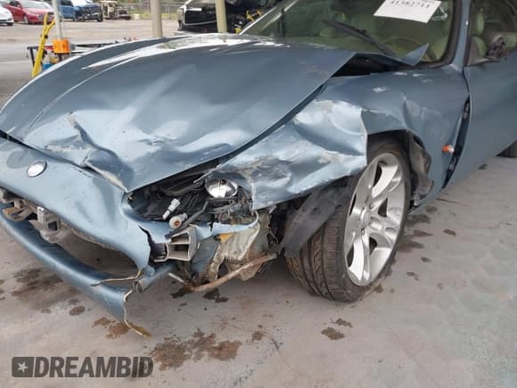 ✅ 2004 Jaguar XK • VIN: SAJDA42C442A37063 • Lot: 41382711. Listed on IAAI with 90,010 mi. Free auction sales archive from the USA and detailed vehicle history report at DreamBid. Image 6.
