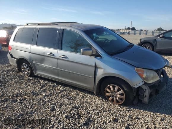 ✅ 2009 Honda Odyssey EX-L • VIN: 5FNRL38609B022992 • Lot: 90474065. Listed on Copart with 106,975 mi. Free auction sales archive from the USA and detailed vehicle history report at DreamBid. Image 4.
