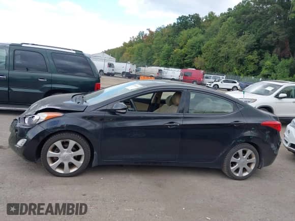 2013 Hyundai Elantra GLS z VIN KMHDH4AE0DU927201, wystawiony jako IAAI lot #43383253 z przebiegiem 117 024 mil mil oraz . Historia ofert i sprzedaży dostępna na DreamBid. Obrazek 14.