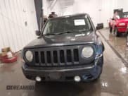 ✅ 2015 Jeep Patriot Altitude • VIN: 1C4NJRBBXFD102560 • Lot: 42260925. Listed on IAAI with 183,056 mi. Free auction sales archive from the USA and detailed vehicle history report at DreamBid. Image 12.
