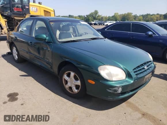 1999 Hyundai Sonata GLS with VIN KMHWF35V9XA100869, listed as a Copart auction lot 68219694 with 144,388 mi miles and Non repairable. Bid and sale history available at DreamBid. Image 4.