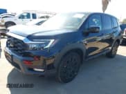 ✅ 2022 Honda Passport EX-L • VIN: 5FNYF7H57NB006607 • Lot: 42856801. Listed on IAAI with 29,366 mi. Free auction sales archive from the USA and detailed vehicle history report at DreamBid. Image 2.