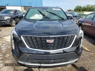 ✅ 2021 Cadillac XT4 AWD Premium Luxury • VIN: 1GYFZDR48MF062000 • Лот: 71239085. Опубликован ранее на Copart с пробегом 40 958 миль. Бесплатный доступ к архиву аукционных продаж из США и подробный отчёт об истории автомобиля на DreamBid. Изображение 5.