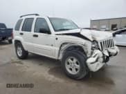 ✅ 2003 Jeep Liberty Limited • VIN: 1J4GK58K83W504657 • Lot: 43963775. Listed on Copart with 123,449 mi. Free auction sales archive from the USA and detailed vehicle history report at DreamBid. Image 4.