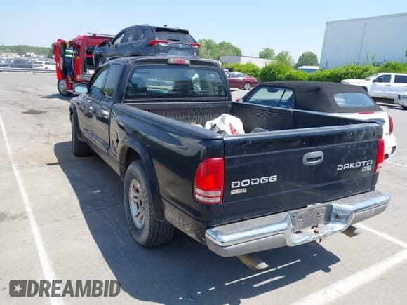 ✅ 2004 Dodge Dakota SLT • VIN: 1D7GL42N14S527342 • Lot: 42081956. Listed on IAAI with 165,157 mi. Free auction sales archive from the USA and detailed vehicle history report at DreamBid. Image 3.