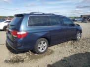 ✅ 2010 Honda Odyssey Touring • VIN: 5FNRL3H91AB032784 • Lot: 83974045. Wystawiony na Copart z przebiegiem 147 197 mil. Bezpłatny archiwum sprzedaży aukcyjnych z USA i szczegółowy raport historii pojazdu na DreamBid. Zdjęcie 3.