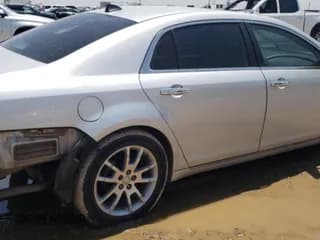 ✅ 2012 Chevrolet Malibu LTZ • VIN: 1G1ZG5E71CF265252 • Lot: 59664154. Listed on Copart with 168,680 mi. Free auction sales archive from the USA and detailed vehicle history report at DreamBid. Image 3.