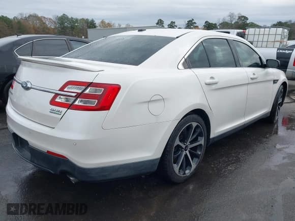 ✅ 2015 Ford Taurus SHO • VIN: 1FAHP2KTXFG158854 • Lot: 43689890. Listed on IAAI with 106,819 mi. Free auction sales archive from the USA and detailed vehicle history report at DreamBid. Image 4.