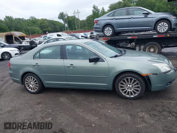 ✅ 2008 Mercury Milan Premier • VIN: 3MEHM02108R663219 • Lot: 43024563. Listed on IAAI with 51,903 mi. Free auction sales archive from the USA and detailed vehicle history report at DreamBid. Image 13.