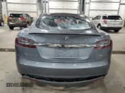 ✅ 2014 Tesla Model S 60 • VIN: 5YJSA1H15EFP49071 • Lot: 89898625. Wystawiony na Copart z przebiegiem 171 150 mil. Bezpłatny archiwum sprzedaży aukcyjnych z USA i szczegółowy raport historii pojazdu na DreamBid. Zdjęcie 6.
