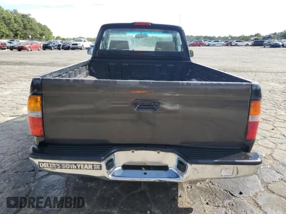 ✅ 1999 Toyota Tacoma • VIN: 4TANL42N9XZ558167 • Lot: 84836295. Listed on Copart with 271,147 mi. Free auction sales archive from the USA and detailed vehicle history report at DreamBid. Image 6.
