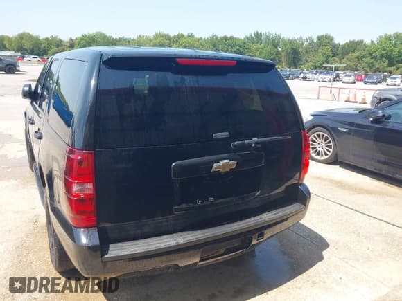 ✅ 2011 Chevrolet Tahoe Commercial • VIN: 1GNLC2E00BR258629 • Lot: 42878822. Listed on IAAI with 199,240 mi. Free auction sales archive from the USA and detailed vehicle history report at DreamBid. Image 16.