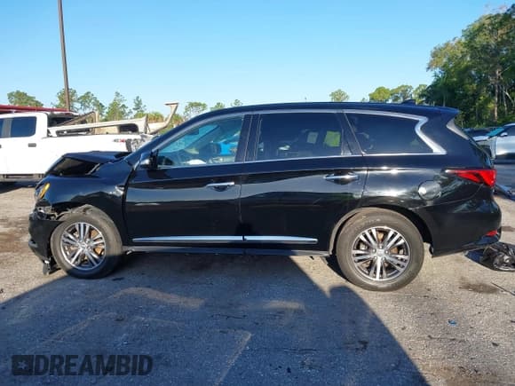 ✅ 2020 Infiniti QX60 Luxe • VIN: 5N1DL0MM6LC521745 • Lot: 42265588. Listed on IAAI with 172,263 mi. Free auction sales archive from the USA and detailed vehicle history report at DreamBid. Image 14.