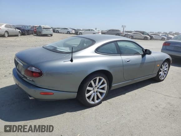 ✅ 2006 Jaguar XK • VIN: SAJDA41C862A47440 • Lot: 60497305. Listed on Copart with 86,170 mi. Free auction sales archive from the USA and detailed vehicle history report at DreamBid. Image 3.