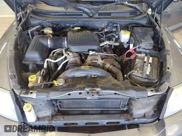 2006 Dodge Dakota SLT z VIN 1D7HW48N26S619341, wystawiony jako Copart lot #70210794 z przebiegiem 81 671 mil mil oraz Czysty tytuł • Clean title. Historia ofert i sprzedaży dostępna na DreamBid. Obrazek 11.