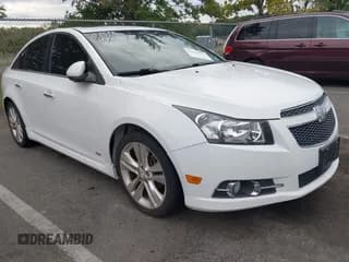 ✅ 2014 Chevrolet Cruze LTZ • VIN: 1G1PG5SB6E7359995 • Lot: 43230727. Listed on IAAI with 143,019 mi. Free auction sales archive from the USA and detailed vehicle history report at DreamBid. Image 1.