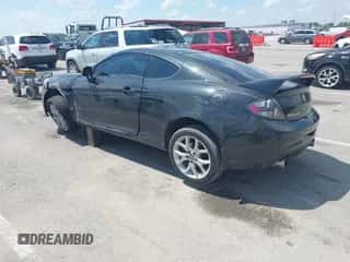 2007 Hyundai Tiburon GT с VIN KMHHN66F17U261929, выставлен на аукционе IAAI как лот 42679006 с пробегом 100 213 миль миль и . История ставок и продаж доступна на DreamBid. Изображение 3.