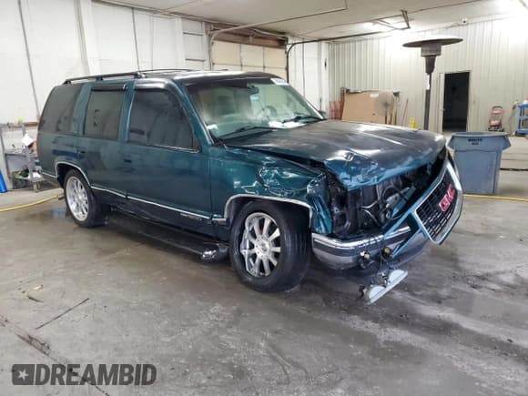 ✅ 1998 GMC Yukon • VIN: 1GKEC13RXWJ731667 • Lot: 78848954. Listed on Copart with 202,164 mi. Free auction sales archive from the USA and detailed vehicle history report at DreamBid. Image 4.